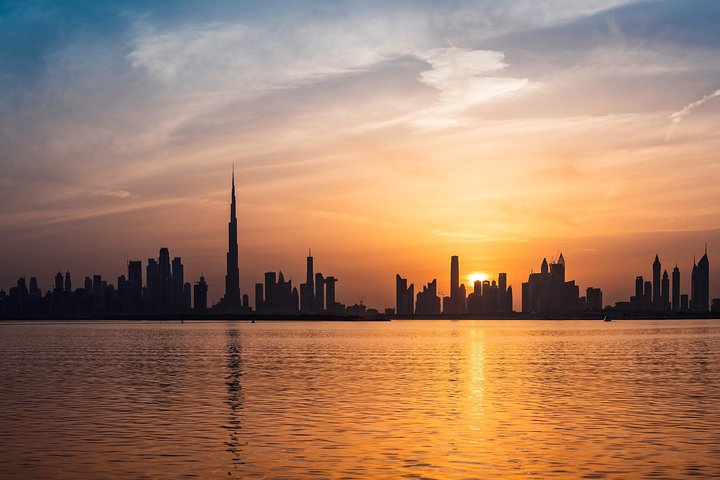 Capture unforgettable moments against the stunning backdrop of Dubai's skyline at sunset perfect for solo adventurers or couples seeking to create lasting memories during their travels.